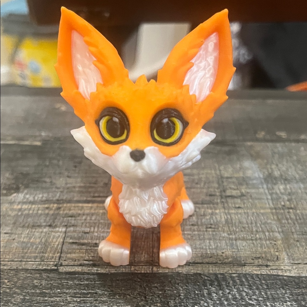 Orange and White Fox Figurine